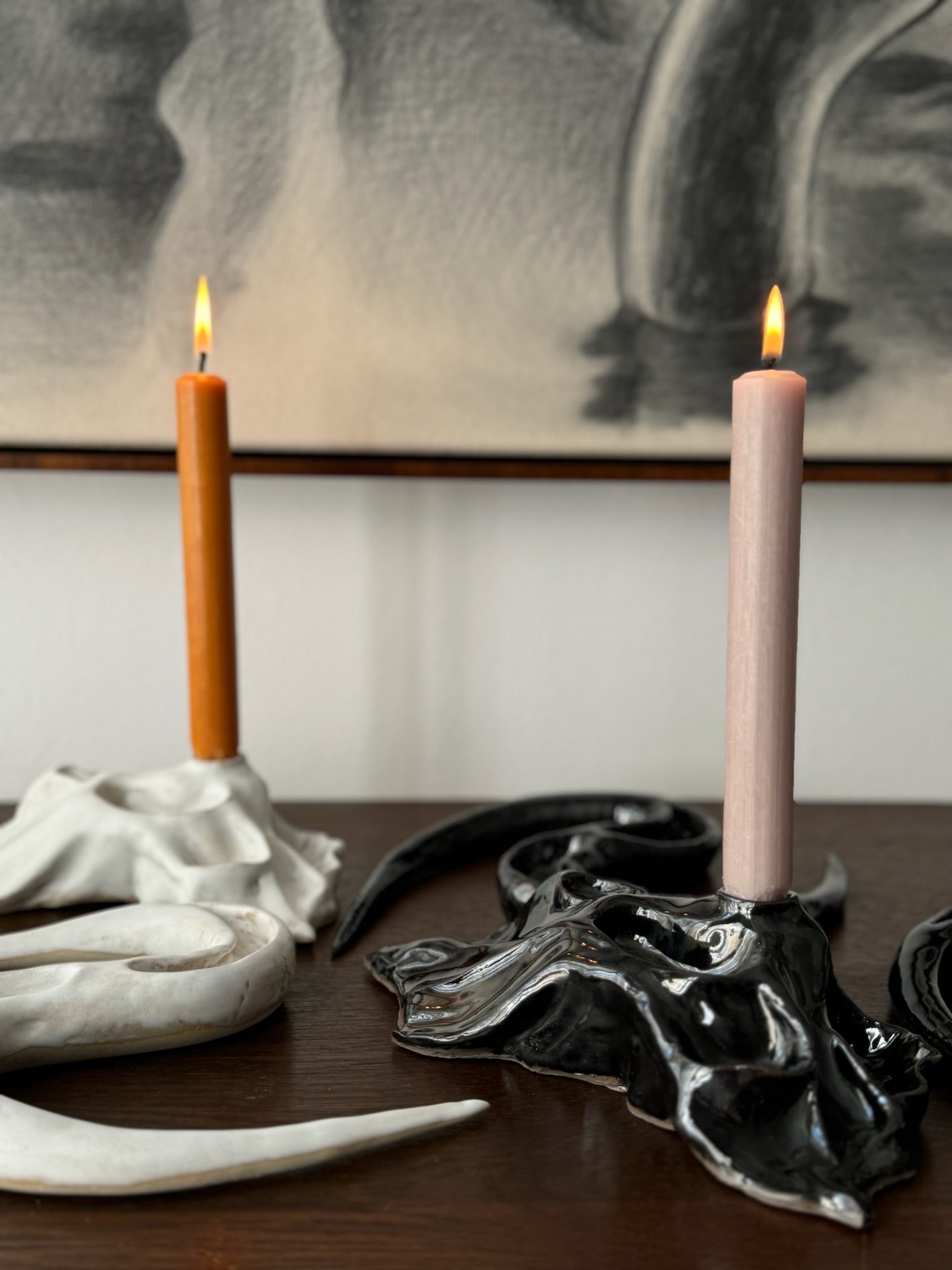 Two limited edition candleholders in black and white designed by Aline Schwörer