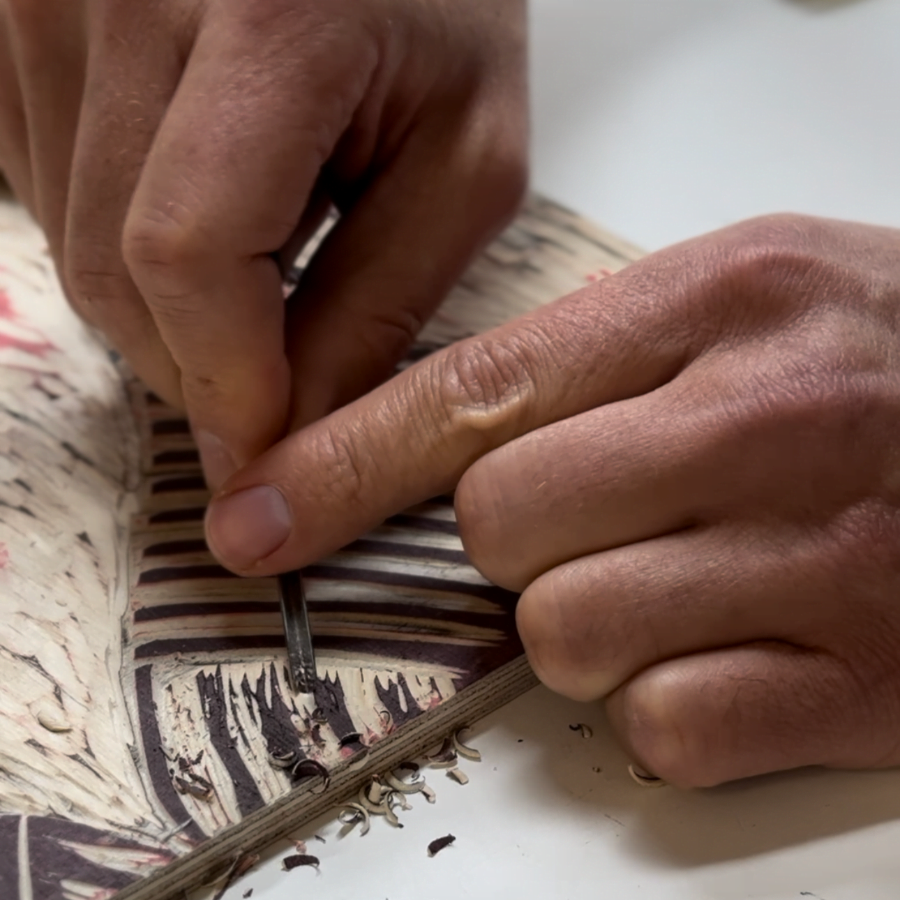 Dennis Scholl in the printing workshop working on his print