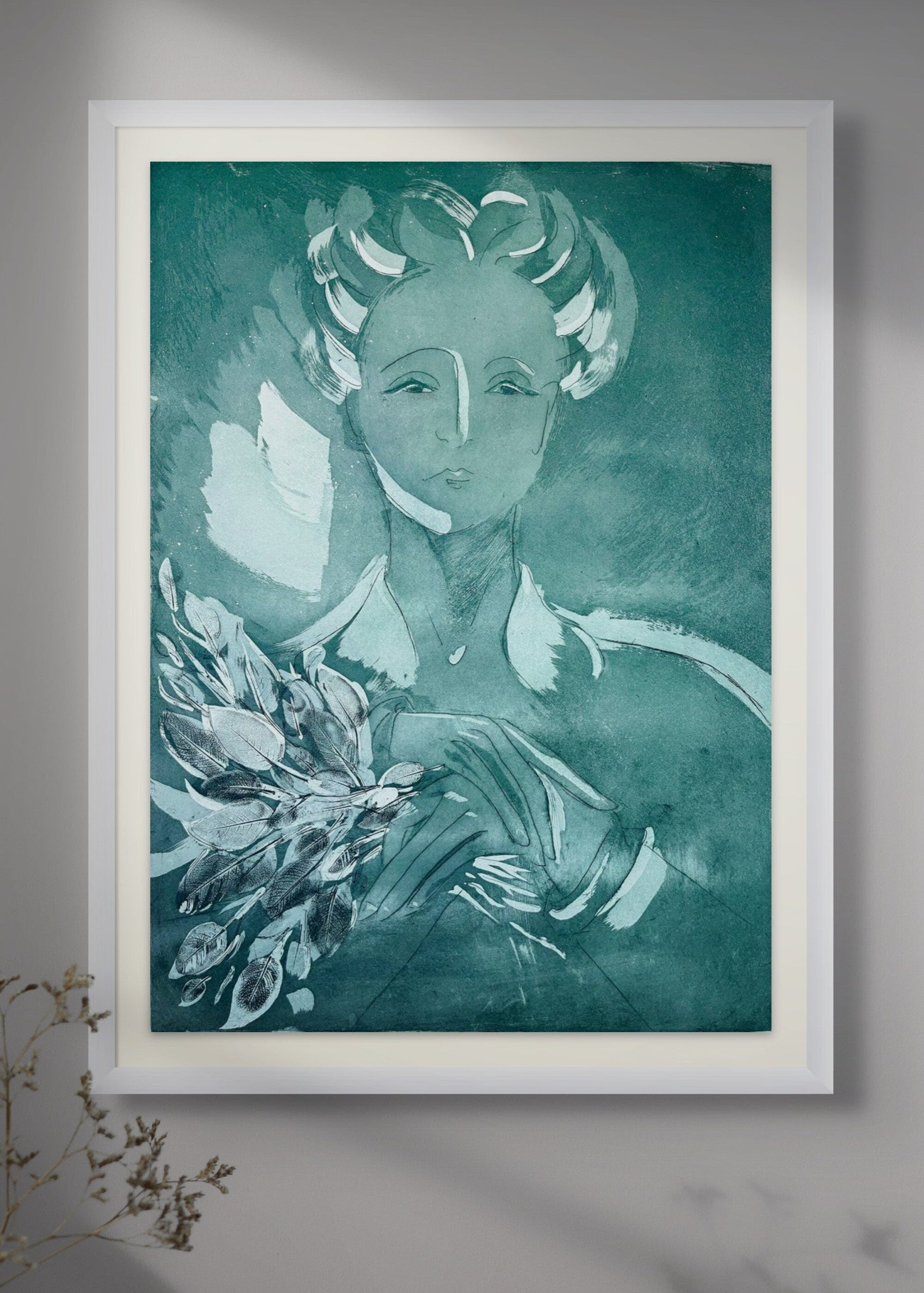 Framed artwork of a stylized portrait with flowers by Donna Volta Newmen