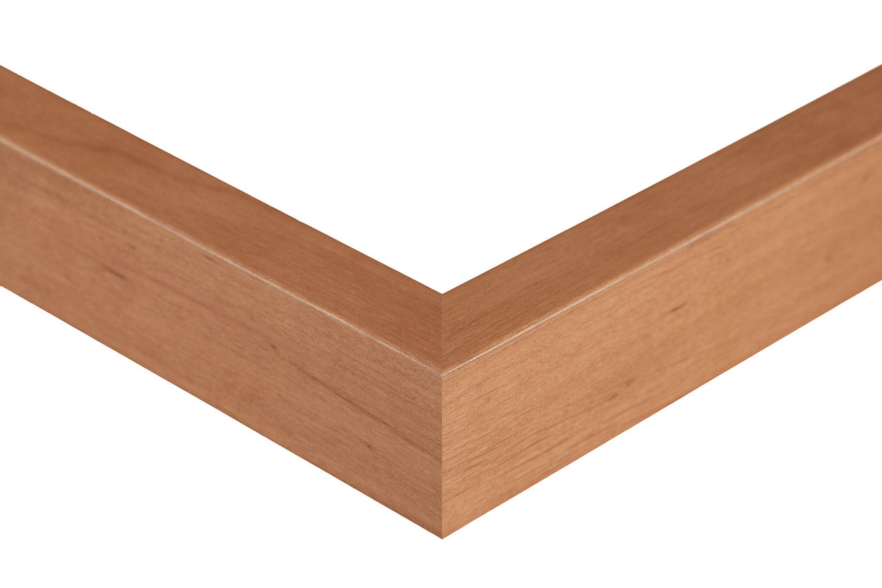 Close-up of a wooden frame corner on a white background, dark alder frame slat