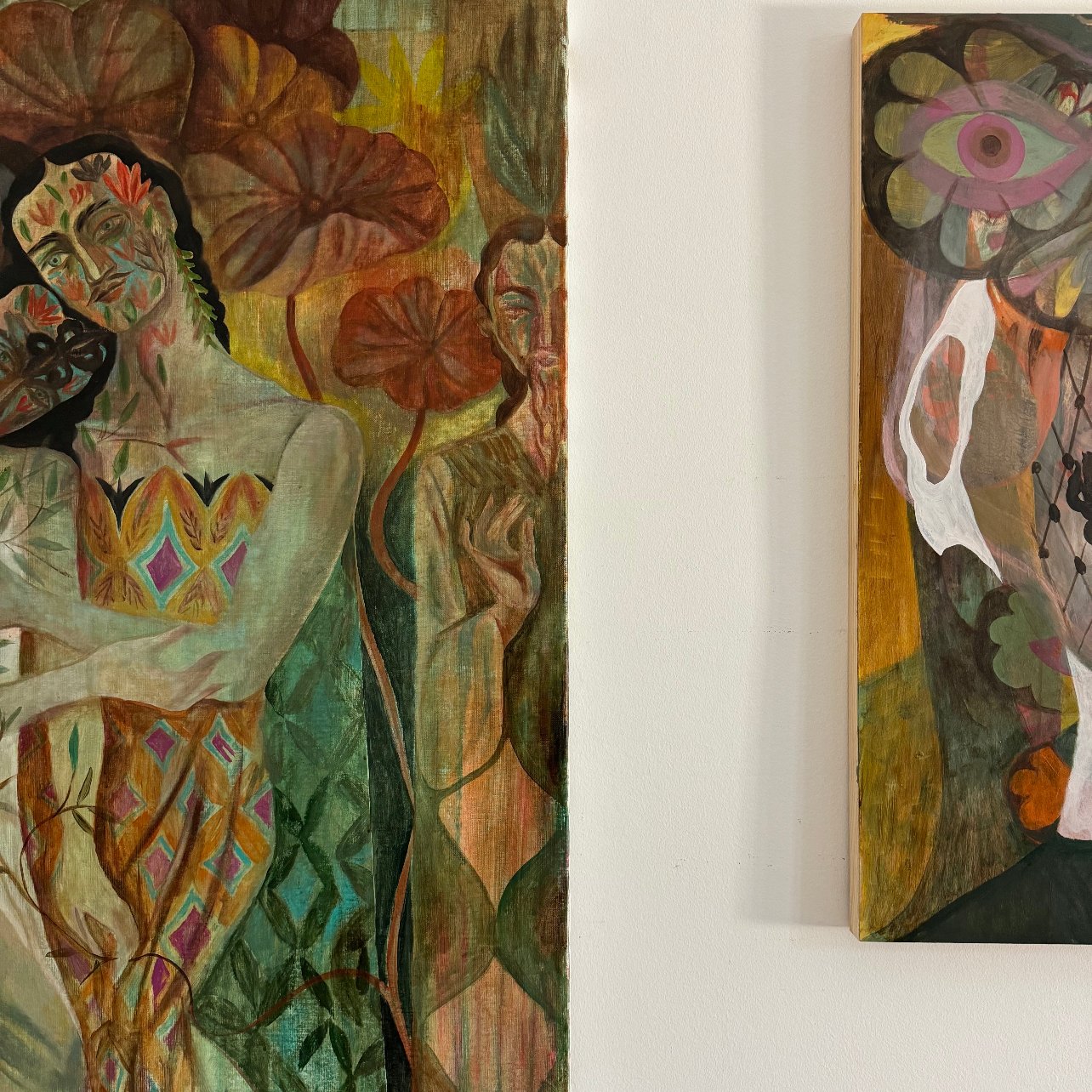 View of two paintings by Olaf Hajek in his studio