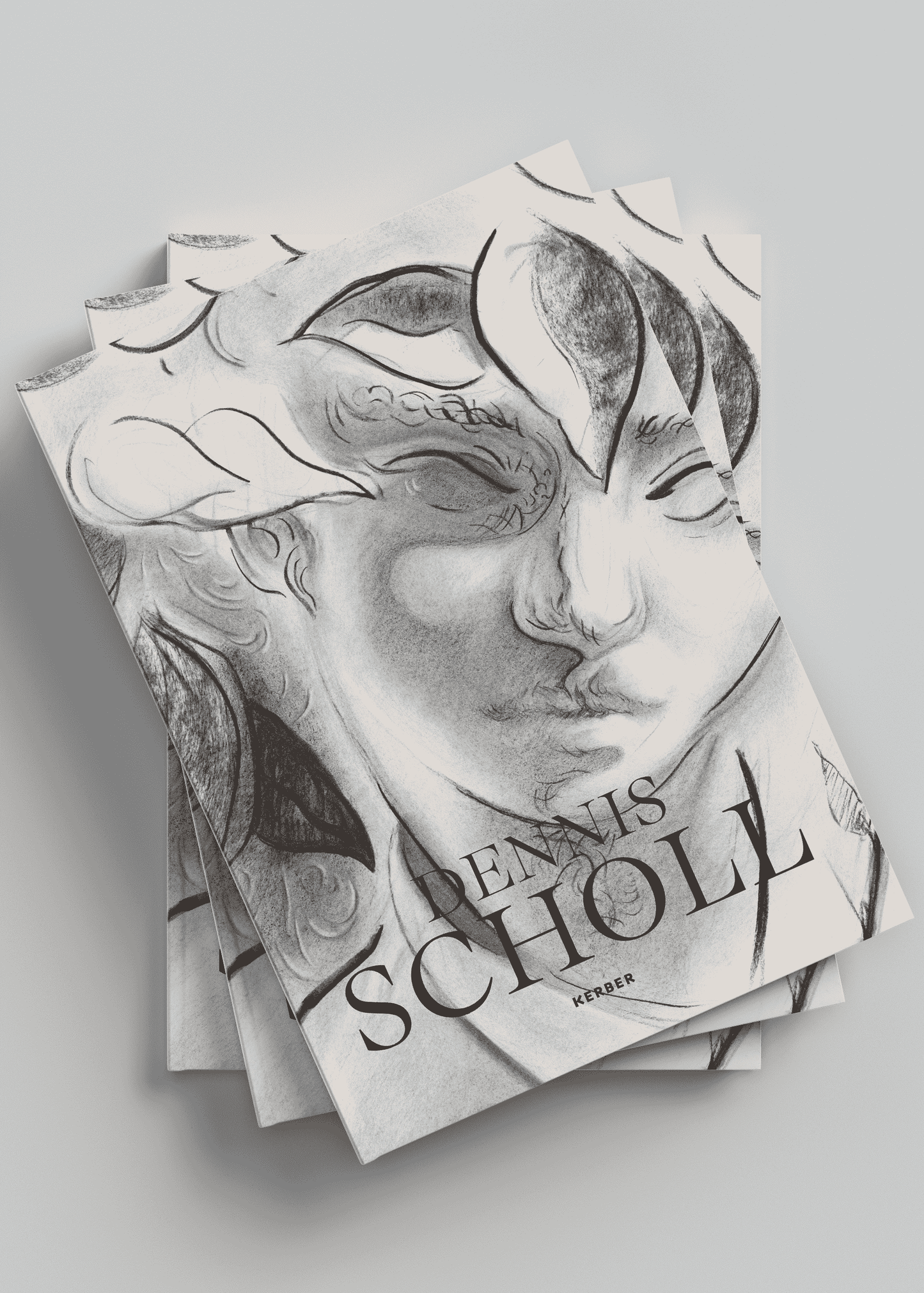 Stack of books with a cover featuring an artistic face design on a light gray background