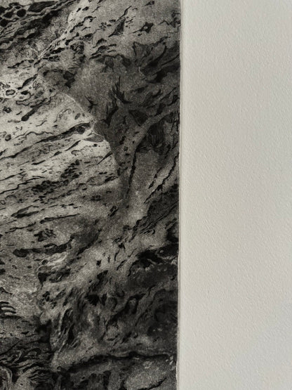 Detail of an etching by Erika Richter showing a rock formation. 