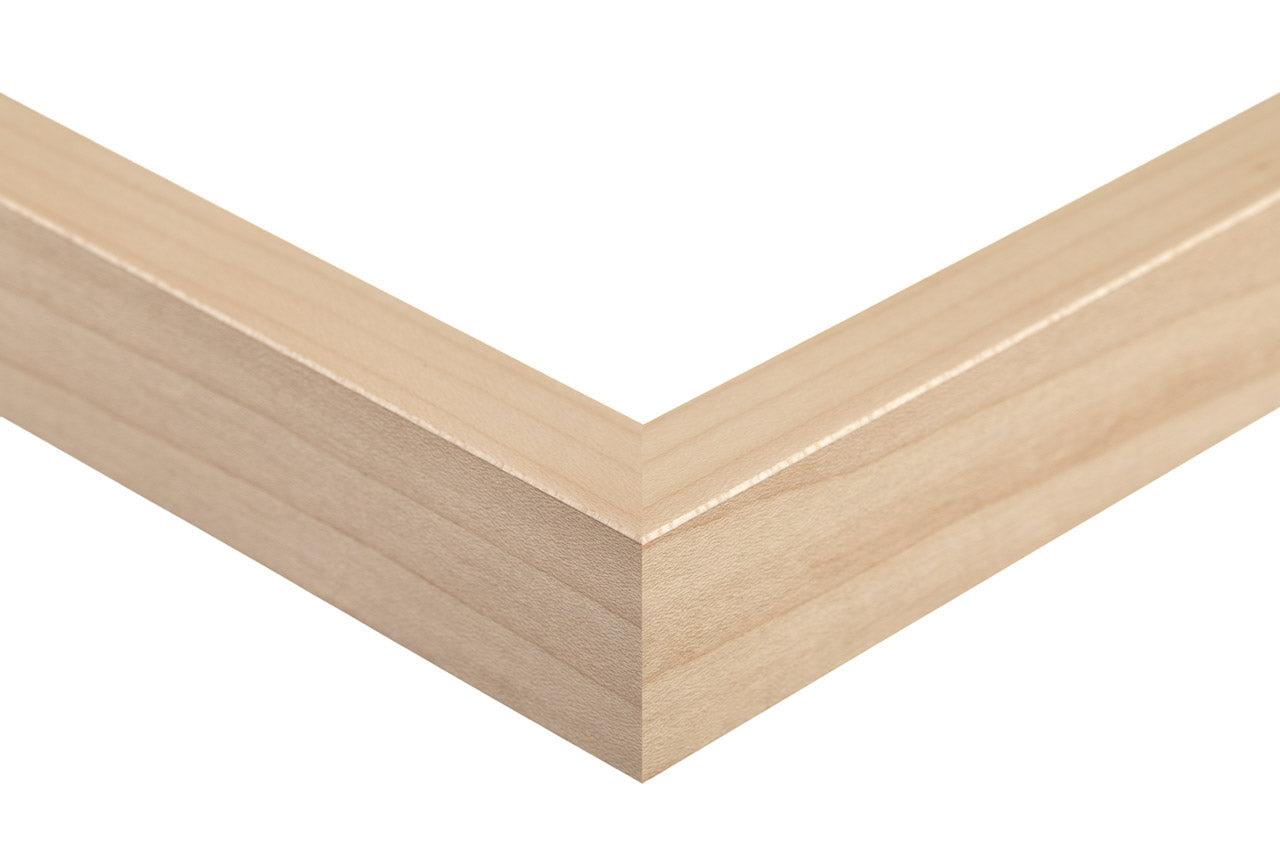 Close-up of a wooden frame corner on a white background, natural maple frame slat