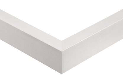 White picture frame corner on a white background, white maple slat