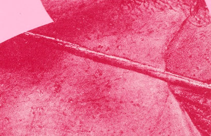 Close-up of an etching with pink and gray tones