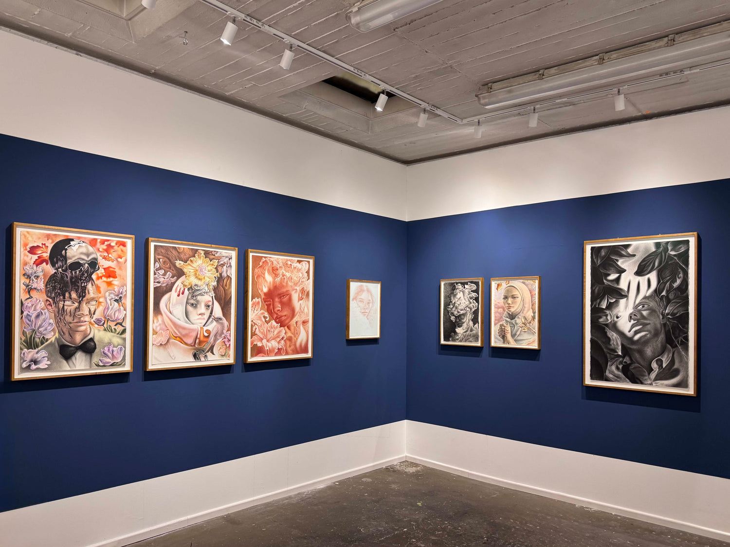 Art gallery Friday Bird with various artworks by Dennis Scholl on blue walls