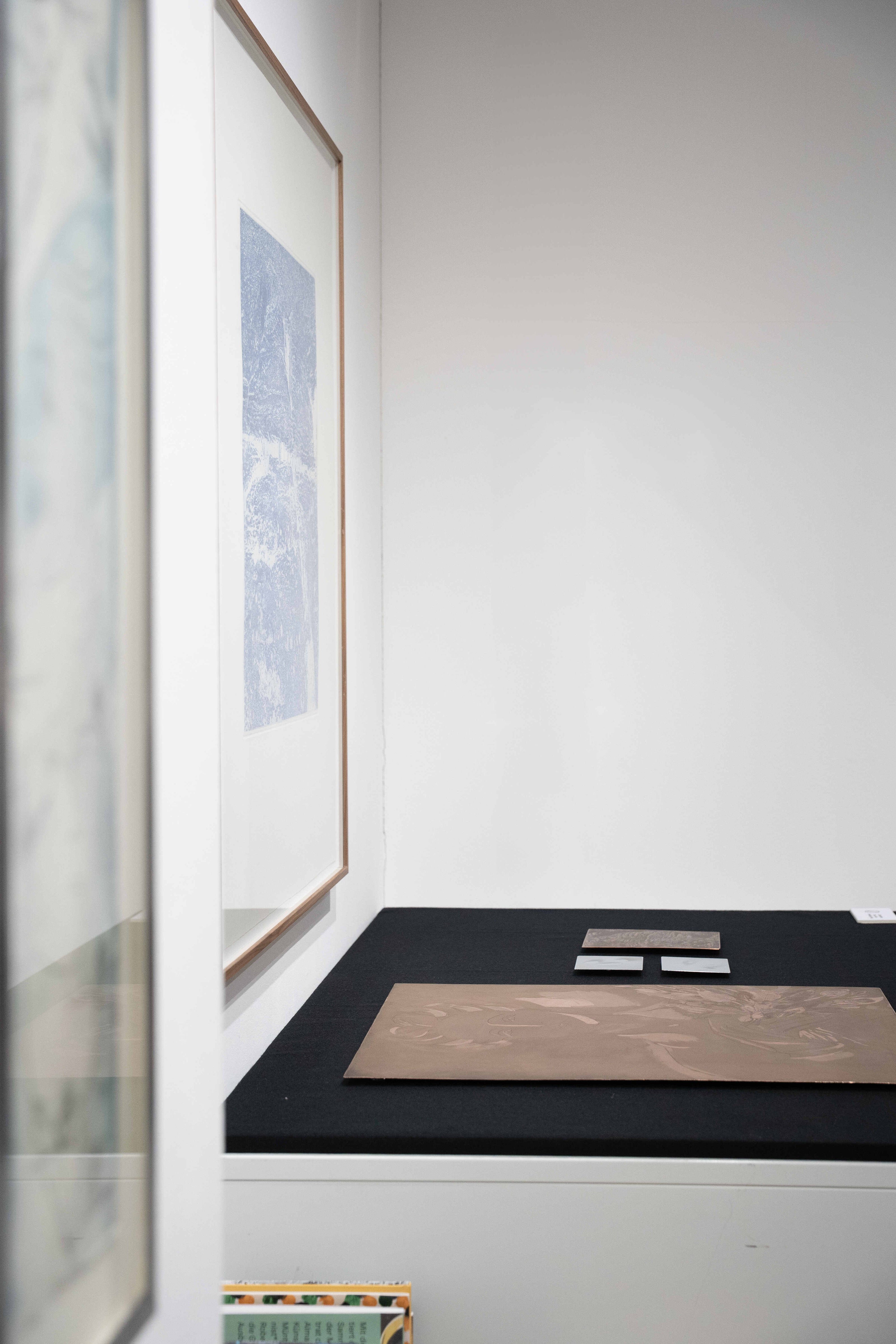 Framed artwork by Erika Richter ad etching plates