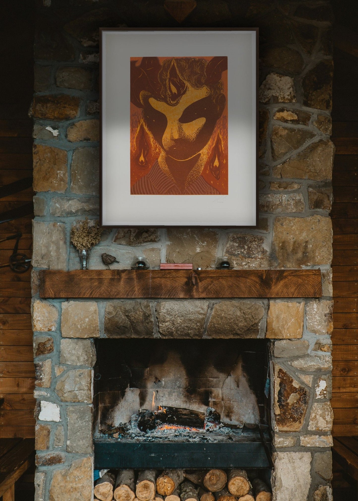 woodcut with a figure surrounded by flames hanging over a chimney